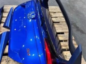 blue trunk lid and spoiler assembly for a 10th generation Honda Civic.